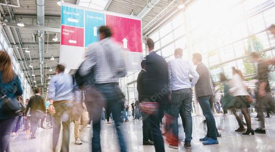 crowd of business people walking at a trade fair  : Stock Photo or Stock Video Download rcfotostock photos, images and assets rcfotostock | RC Photo Stock.: