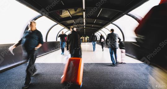 crowd of commuters rushing through in a airport terminal tunnel  : Stock Photo or Stock Video Download rcfotostock photos, images and assets rcfotostock | RC Photo Stock.: