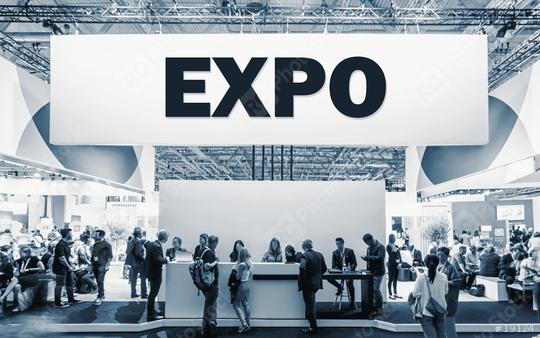 Crowd of people at a trade show booth with a banner and the text EXPO.  : Stock Photo or Stock Video Download rcfotostock photos, images and assets rcfotostock | RC Photo Stock.: