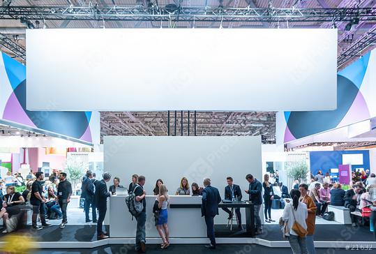 Crowd of people at a trade show booth with a banner and the text Trade Fair  : Stock Photo or Stock Video Download rcfotostock photos, images and assets rcfotostock | RC Photo Stock.: