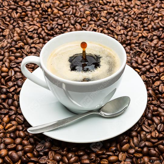 cup of coffee with drop on beans  : Stock Photo or Stock Video Download rcfotostock photos, images and assets rcfotostock | RC Photo Stock.: