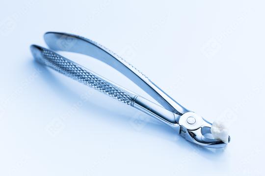 dental forceps for wisdom tooth extraction  : Stock Photo or Stock Video Download rcfotostock photos, images and assets rcfotostock | RC Photo Stock.: