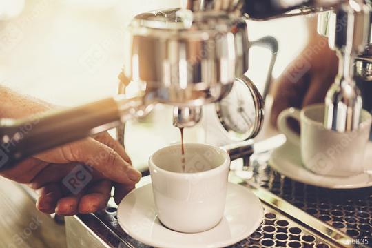 Details of barista preparing fresh espresso on industrial brewing machinery   : Stock Photo or Stock Video Download rcfotostock photos, images and assets rcfotostock | RC Photo Stock.: