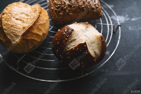 Different kinds of bread rolls of a bakery grid on a black board   : Stock Photo or Stock Video Download rcfotostock photos, images and assets rcfotostock | RC Photo Stock.: