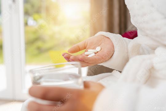 different white pills in young female hand with water glass  : Stock Photo or Stock Video Download rcfotostock photos, images and assets rcfotostock | RC Photo Stock.: