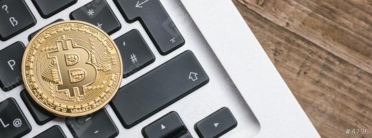 Digital cryptocurrency Bitcoin on a Notebook  : Stock Photo or Stock Video Download rcfotostock photos, images and assets rcfotostock | RC Photo Stock.: