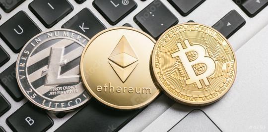 Digital cryptocurrencys Bitcoin, Ethereum, Litecoin on a notebook  : Stock Photo or Stock Video Download rcfotostock photos, images and assets rcfotostock | RC Photo Stock.: