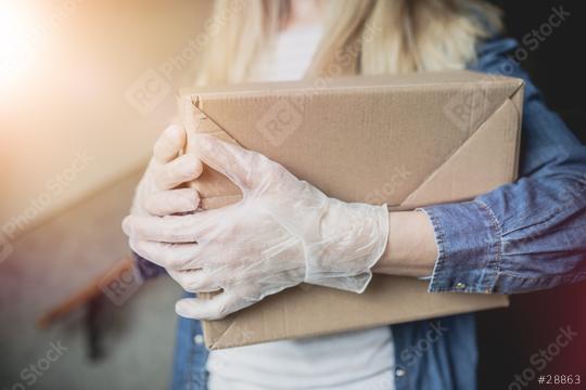 Dispatch postman bring parcels and post in covid 19 quarantine to the front home door with a face mask ffp2 and protection gloves  : Stock Photo or Stock Video Download rcfotostock photos, images and assets rcfotostock | RC Photo Stock.: