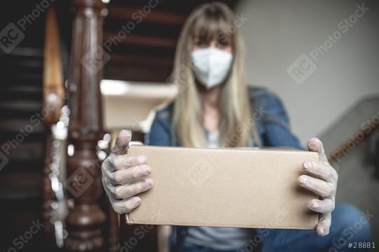 Dispatch postman bring parcels and post in covid 19 quarantine to the front home door with a face mask ffp 2 and protection gloves  : Stock Photo or Stock Video Download rcfotostock photos, images and assets rcfotostock | RC Photo Stock.: