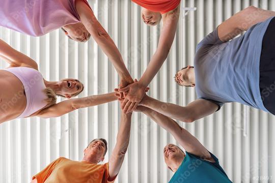 diverse group of people in a circle, hands together in a gym  : Stock Photo or Stock Video Download rcfotostock photos, images and assets rcfotostock | RC Photo Stock.: