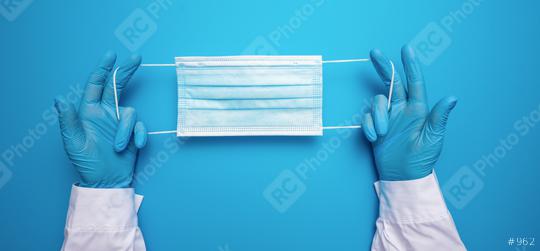 Doctor Hands in gloves showing medical face mask on blue background. Preventive measures to protect against Covid-19 Corona virus infection.  : Stock Photo or Stock Video Download rcfotostock photos, images and assets rcfotostock | RC Photo Stock.: