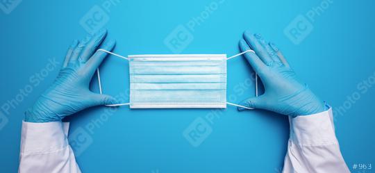 Doctor Hands in gloves showing medical face mask on blue background. Preventive measures to protect against Covid-19 Corona virus infection.  : Stock Photo or Stock Video Download rcfotostock photos, images and assets rcfotostock | RC Photo Stock.: