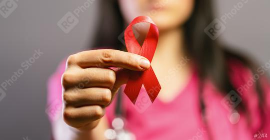 Doctor holding pink ribbon. Breast cancer awareness concept  : Stock Photo or Stock Video Download rcfotostock photos, images and assets rcfotostock | RC Photo Stock.:
