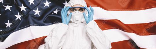 Doctor or Nurse Wearing Medical Personal Protective Equipment (PPE) Against The American Flag Banner. prevent corona COVID-19 and SARS infection concept image, banner size  : Stock Photo or Stock Video Download rcfotostock photos, images and assets rcfotostock | RC Photo Stock.: