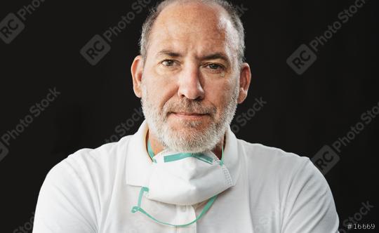 Doctor wearing an anti virus protection mask to prevent others from corona COVID-19 and SARS cov 2 infection  : Stock Photo or Stock Video Download rcfotostock photos, images and assets rcfotostock | RC Photo Stock.: