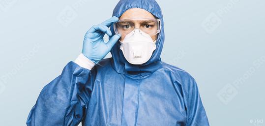 Doctor wearing protection Suit for Fighting Covid-19 (Corona virus) SARS infection Protective Equipment (PPE) with N95 or ffp3 mask.  : Stock Photo or Stock Video Download rcfotostock photos, images and assets rcfotostock | RC Photo Stock.: