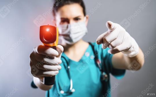 doctor wearing protective surgical mask ready to use infrared forehead thermometer (thermometer gun) to check body temperature for corona virus COVID-19 and SARS cov 2 infection symptoms  : Stock Photo or Stock Video Download rcfotostock photos, images and assets rcfotostock | RC Photo Stock.:
