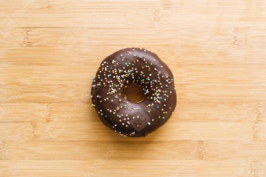 donut with chocolate glazed and sprinkles. directly above shot  : Stock Photo or Stock Video Download rcfotostock photos, images and assets rcfotostock | RC Photo Stock.: