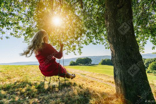 dream concept, beautiful young woman on the swing, inspiring landscape  : Stock Photo or Stock Video Download rcfotostock photos, images and assets rcfotostock | RC Photo Stock.: