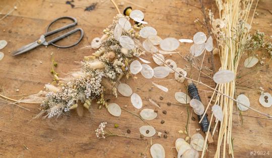 Dried floral arrangement on a wooden table with scissors and bundles of wheat and flowers  : Stock Photo or Stock Video Download rcfotostock photos, images and assets rcfotostock | RC Photo Stock.: