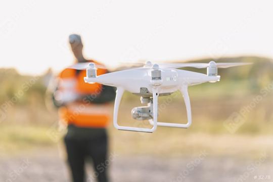 Drone inspection. Operator inspecting construction building site flying with drone  : Stock Photo or Stock Video Download rcfotostock photos, images and assets rcfotostock | RC Photo Stock.: