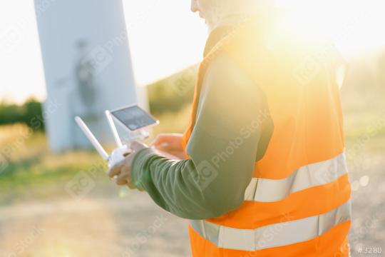 Drone inspection. Operator inspecting construction site flying with drone  : Stock Photo or Stock Video Download rcfotostock photos, images and assets rcfotostock | RC Photo Stock.: