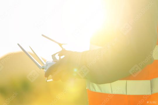 drone remote controll quadcopter flying at sunset  : Stock Photo or Stock Video Download rcfotostock photos, images and assets rcfotostock | RC Photo Stock.: