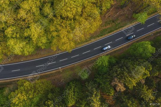 Drone view of cars driving on suburban road on background summer forest  : Stock Photo or Stock Video Download rcfotostock photos, images and assets rcfotostock | RC Photo Stock.:
