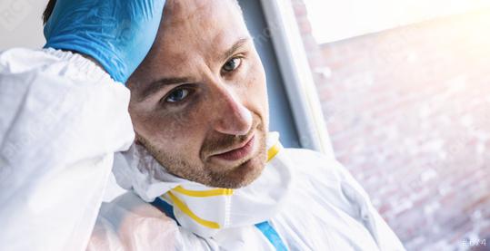 EExhausted clinician in intensive care unit in coronavirus covid-19 pandemic Sars-CoV-2   : Stock Photo or Stock Video Download rcfotostock photos, images and assets rcfotostock | RC Photo Stock.: