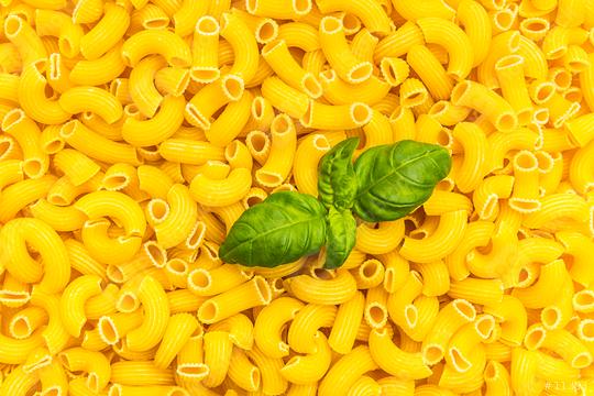 Elbow macaroni with basil texture  : Stock Photo or Stock Video Download rcfotostock photos, images and assets rcfotostock | RC Photo Stock.: