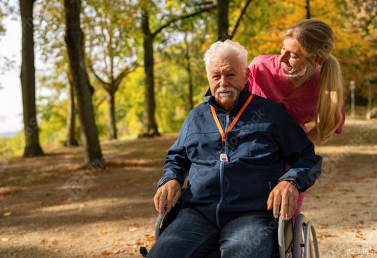 Elderly man in wheelchair outdoors with a caregiver, both smiling, man wearing SOS button. Dementia retirement home concept image  : Stock Photo or Stock Video Download rcfotostock photos, images and assets rcfotostock | RC Photo Stock.: