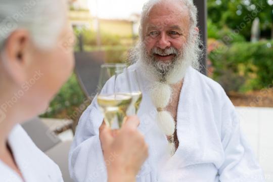 Elderly man with a white beard smiling and toasting with a glass of champagne  : Stock Photo or Stock Video Download rcfotostock photos, images and assets rcfotostock | RC Photo Stock.: