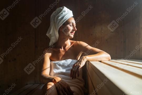 Elderly woman sitting relaxed in a wooden sauna  : Stock Photo or Stock Video Download rcfotostock photos, images and assets rcfotostock | RC Photo Stock.: