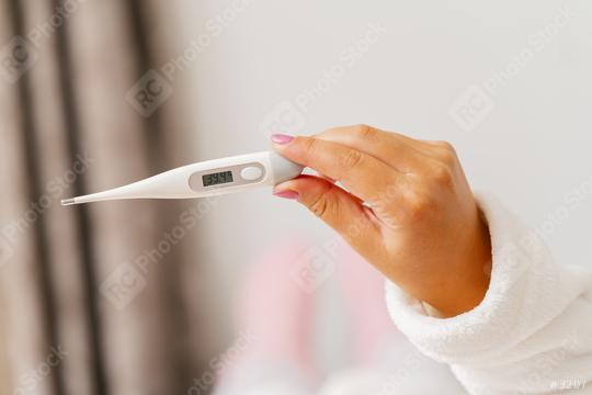 electronic thermometer for measuring body temperature in hand  : Stock Photo or Stock Video Download rcfotostock photos, images and assets rcfotostock | RC Photo Stock.:
