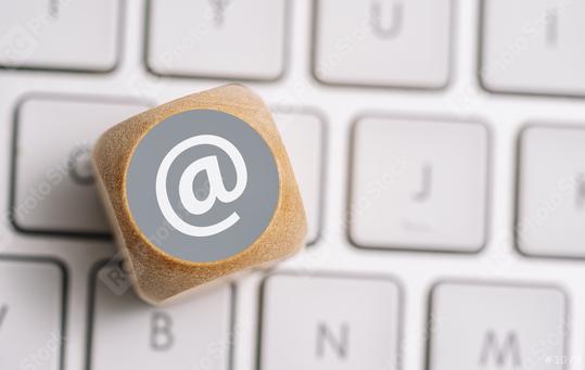 Email at icon on a wood cube on a keyboard. Contact and Communication Methods concept image  : Stock Photo or Stock Video Download rcfotostock photos, images and assets rcfotostock | RC Photo Stock.: