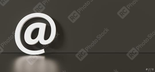 Email Icon or at sign leaning against a black wall as a communication concept, copyspace for your individual text.   : Stock Photo or Stock Video Download rcfotostock photos, images and assets rcfotostock | RC Photo Stock.: