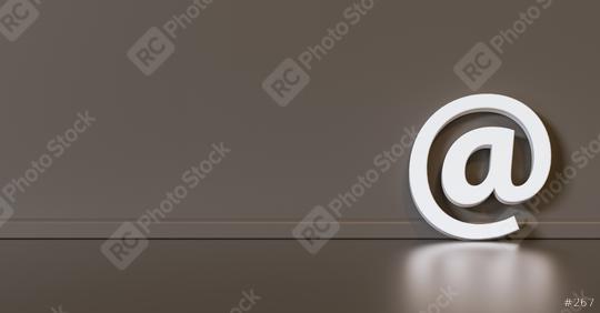 Email Icon or at sign leaning against a gray wall as a communication concept, copyspace for your individual text.  : Stock Photo or Stock Video Download rcfotostock photos, images and assets rcfotostock | RC Photo Stock.:
