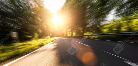 Empty long mountain road to the horizon on a sunny summer day at bright sunset with motion blur, Backplate or Backdrop background.  : Stock Photo or Stock Video Download rcfotostock photos, images and assets rcfotostock | RC Photo Stock.: