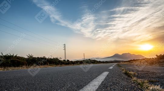 Empty long road on a sunny summer day at bright sunset  : Stock Photo or Stock Video Download rcfotostock photos, images and assets rcfotostock | RC Photo Stock.: