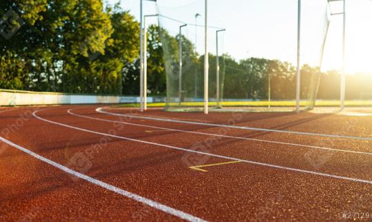 Empty running track lanes in the morning sun  : Stock Photo or Stock Video Download rcfotostock photos, images and assets rcfotostock | RC Photo Stock.: