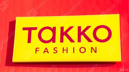 ESCHWEILER, GERMANY FEBRUARY, 2017: TAKKO fashion Logo.. TAKKO is one of the largest German textile traders with over 1,900 branches in Germany and other European countries.  : Stock Photo or Stock Video Download rcfotostock photos, images and assets rcfotostock | RC Photo Stock.: