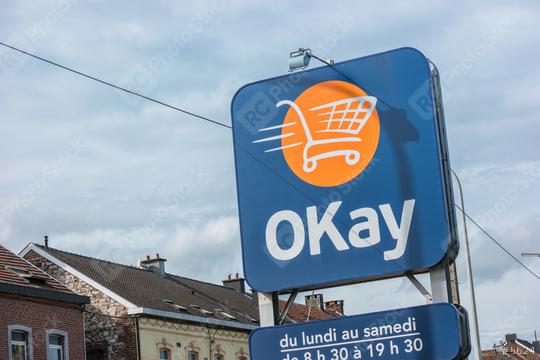 EUPEN, GERMANY OCTOBER, 2017: OKay supermarket logo sign. OKay is a neighbourhood stores supermarket chain of the Colruyt Group.  : Stock Photo or Stock Video Download rcfotostock photos, images and assets rcfotostock | RC Photo Stock.: