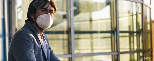 European man in clothes on the street with a medical face mask on. Closeup of a 40-year-old male in a respirator to protect against infection with influenza virus or coronavirus covid 19  : Stock Photo or Stock Video Download rcfotostock photos, images and assets rcfotostock | RC Photo Stock.: