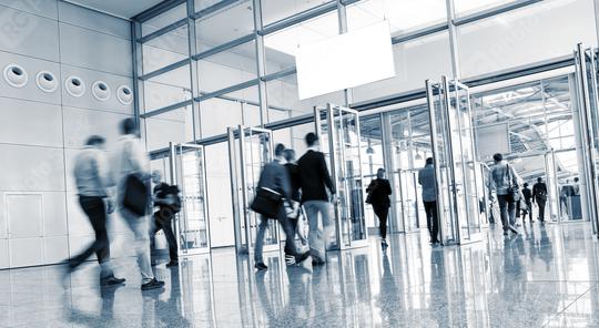 European Tradeshow Visitors walking in a modern hall  : Stock Photo or Stock Video Download rcfotostock photos, images and assets rcfotostock | RC Photo Stock.: