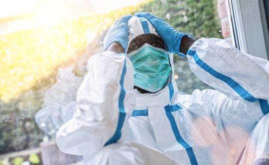 Exhausted clinician in intensive care unit in coronavirus pandemic  : Stock Photo or Stock Video Download rcfotostock photos, images and assets rcfotostock | RC Photo Stock.: