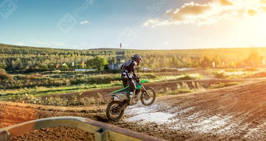 Extreme Motocross MX Rider riding on dirt track  : Stock Photo or Stock Video Download rcfotostock photos, images and assets rcfotostock | RC Photo Stock.: