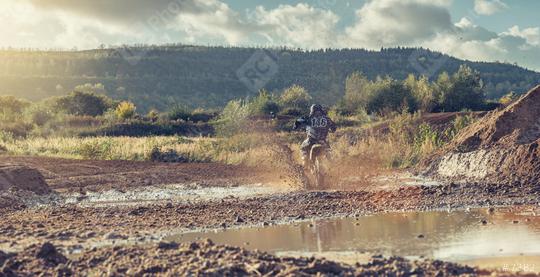Extreme Motocross MX Rider riding on dirt track  : Stock Photo or Stock Video Download rcfotostock photos, images and assets rcfotostock | RC Photo Stock.:
