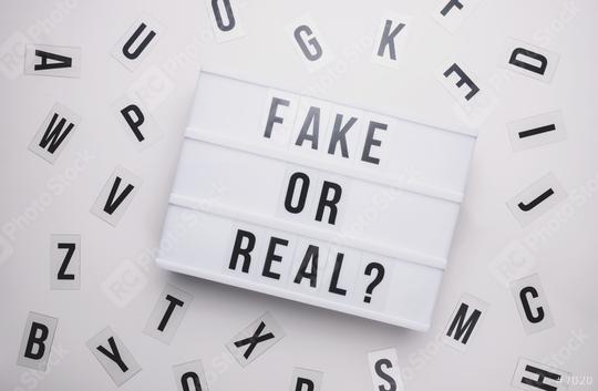 Fake or real displayed on a vintage lightbox, concept image  : Stock Photo or Stock Video Download rcfotostock photos, images and assets rcfotostock | RC Photo Stock.:
