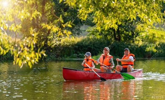 Family of three canoeing on a river, framed by overhanging green branches in golden evening sunlight in bavaria, germany. Family on kayak ride. Wild nature and water fun on summer Vacation.  : Stock Photo or Stock Video Download rcfotostock photos, images and assets rcfotostock | RC Photo Stock.: