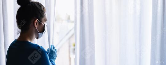fearful woman in corona COVID-19 quarantine looking out of window to the street, banner size, copy space for individual text  : Stock Photo or Stock Video Download rcfotostock photos, images and assets rcfotostock | RC Photo Stock.: